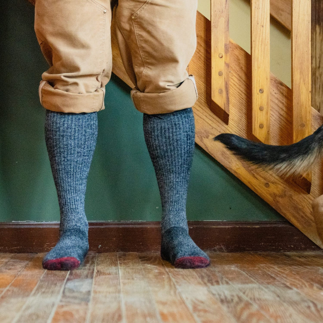 A pair of feet wearing Mountaineering socks after 40 days with no washing