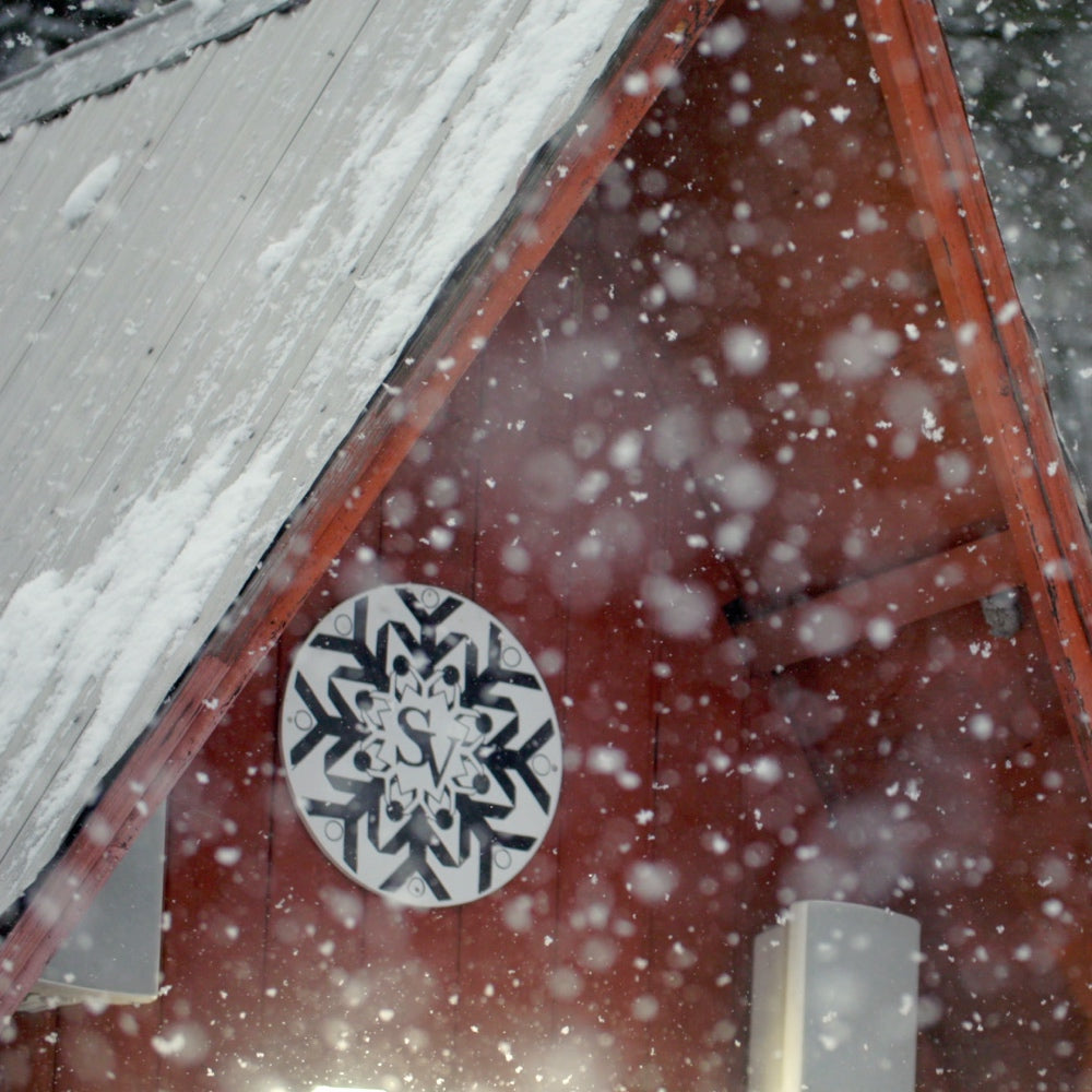 The Ski Venture Logo on the lodge