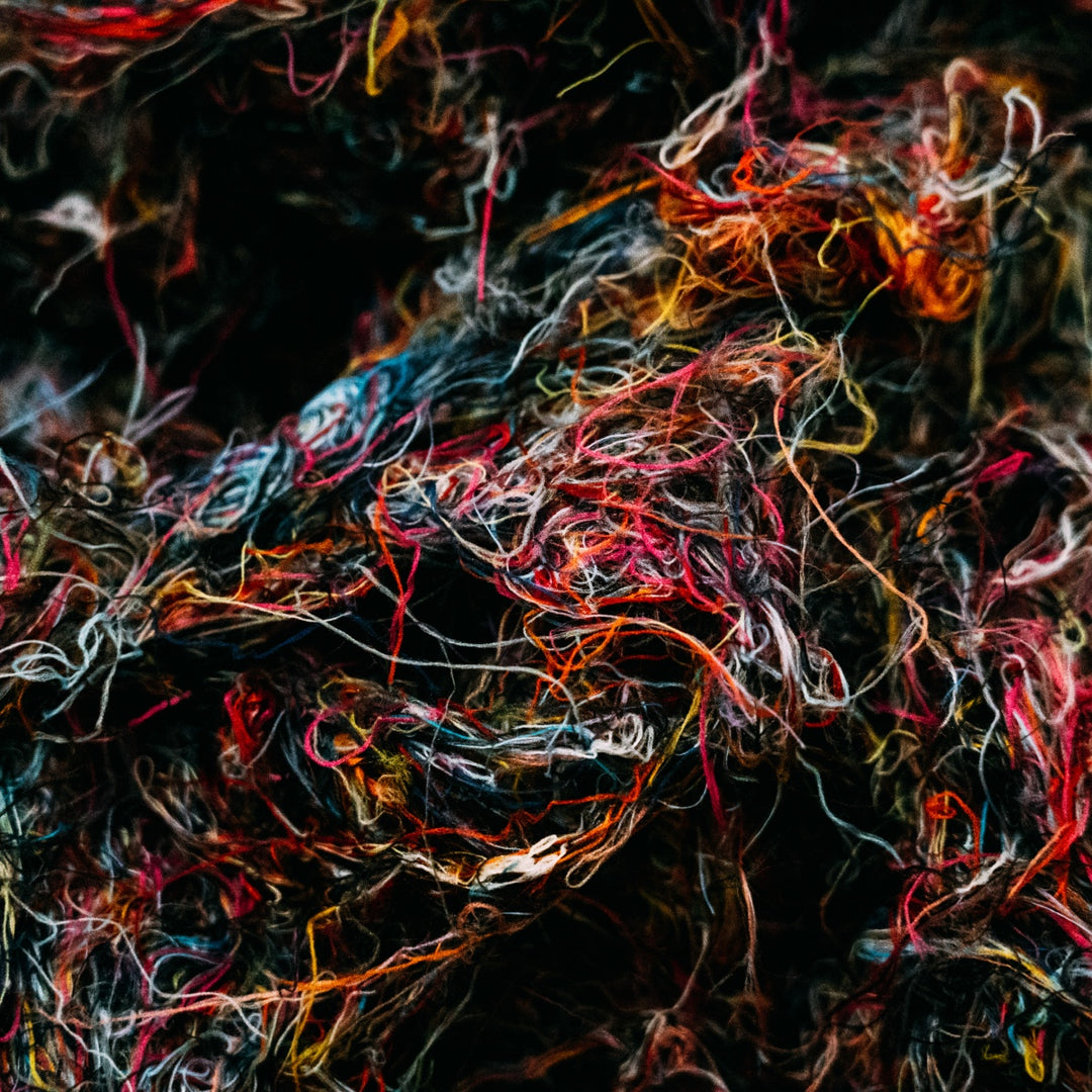 a pile of merino wool yarn fibers