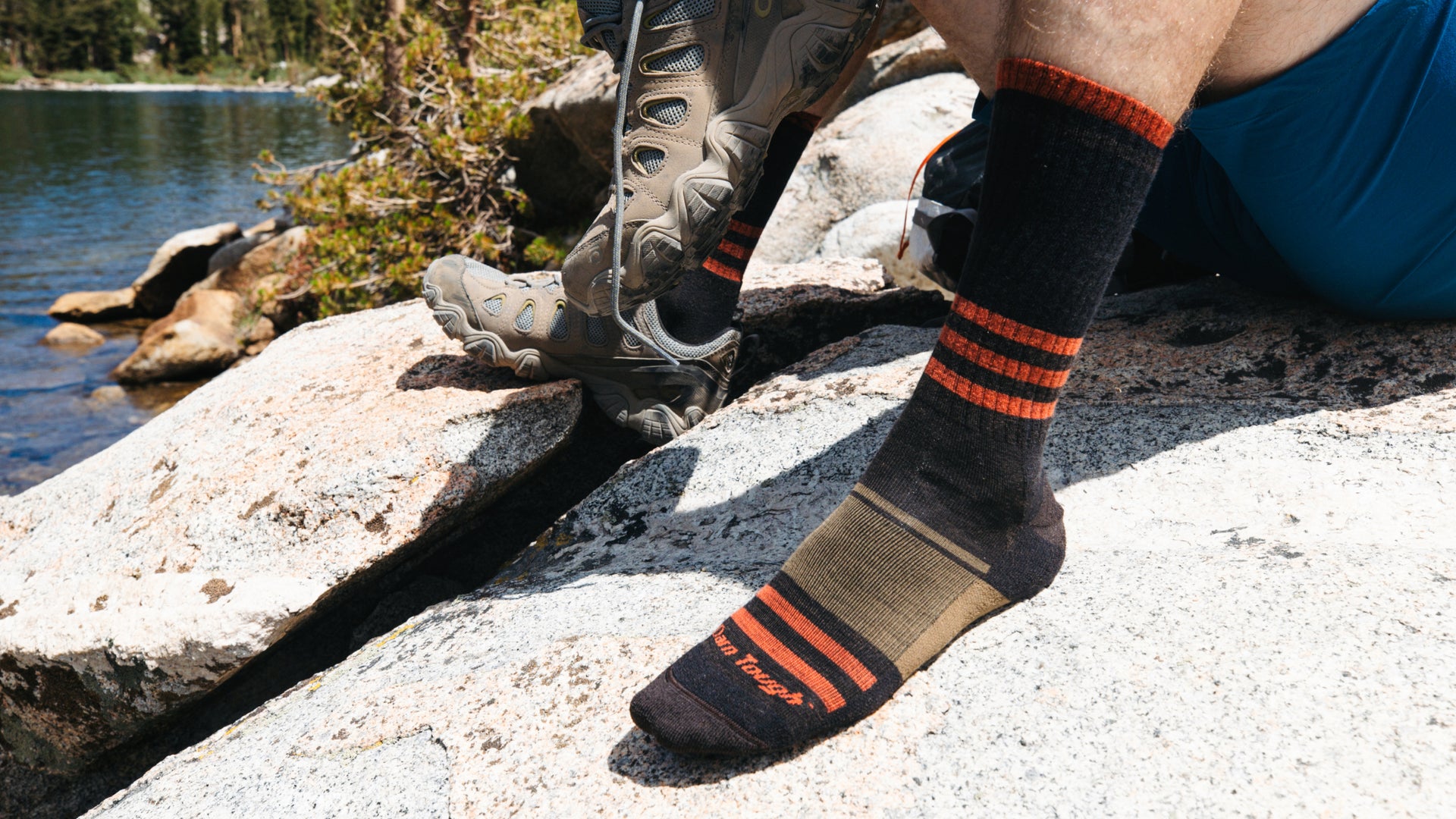 close up on model Featuring the Men's Spur boot sock in Hickory