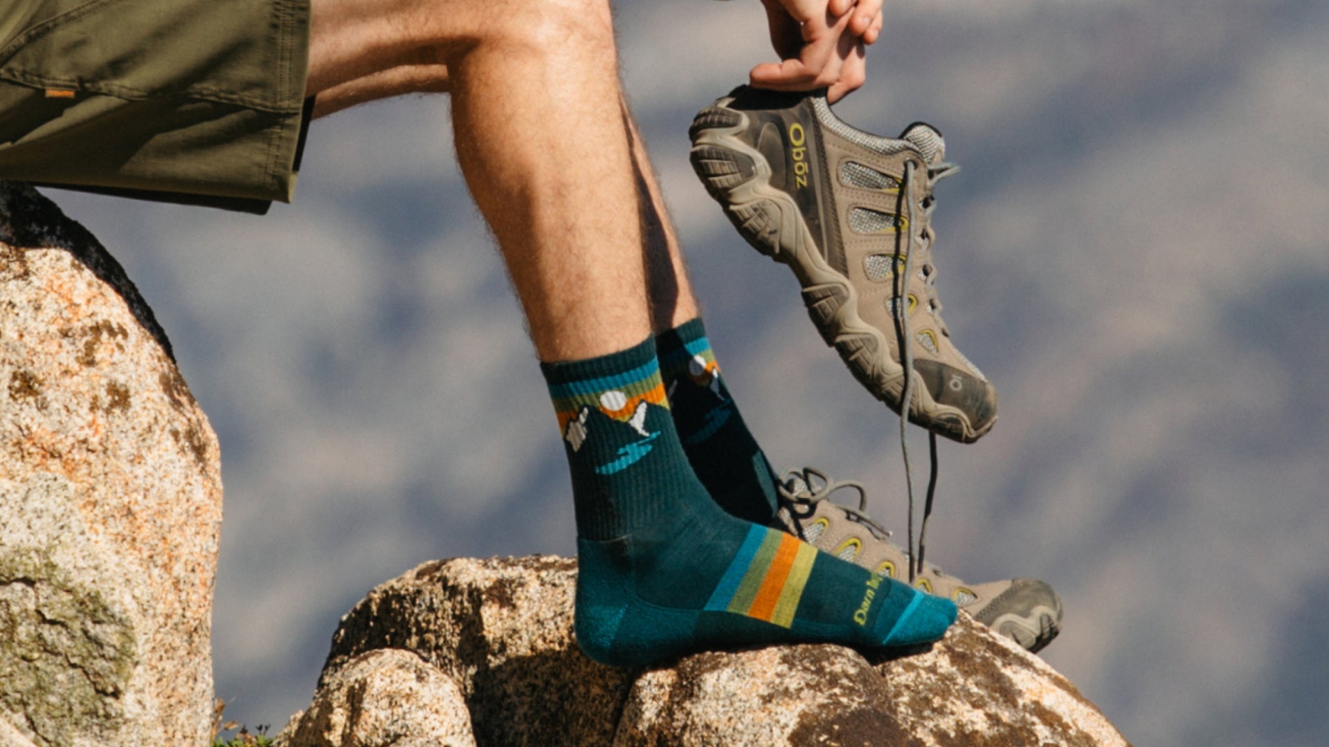 Close up on model featuring the Men's Sunset ridge hiking sock