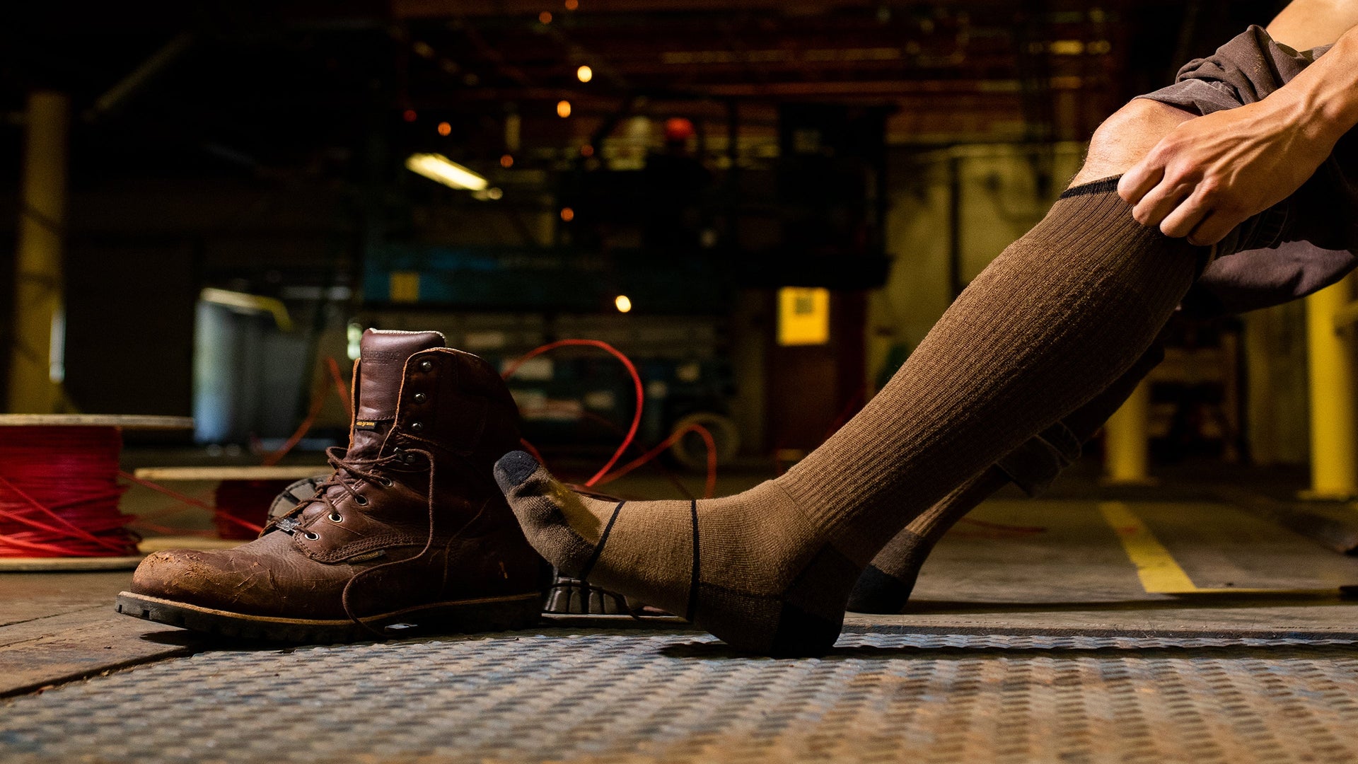 Men's Over the Calf Paul Bunyan Work Sock with work boots.