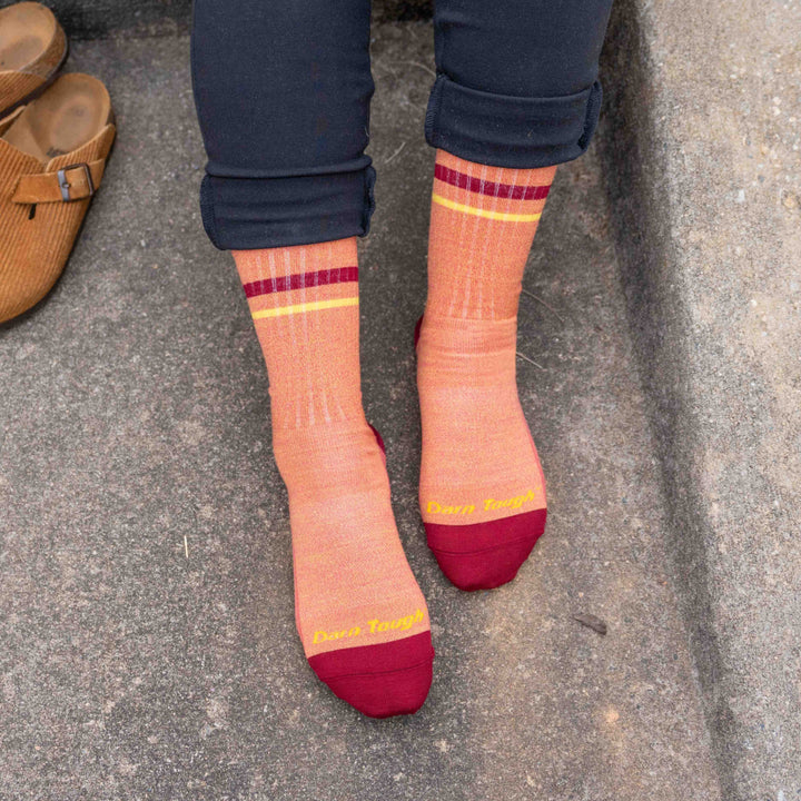 on model image of feet on the ground wearing the 6064 letterman in mango