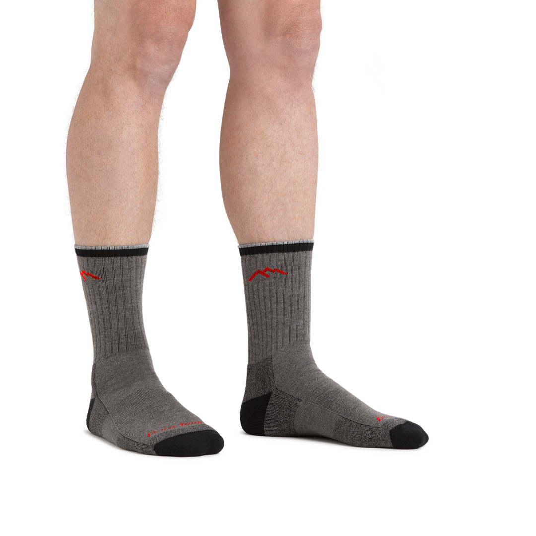 Man standing barefoot wearing Coolmax Hiker Micro Crew Hiking Socks in Gray/Black