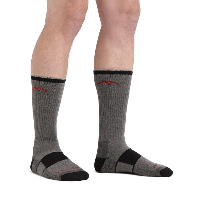 Man standing barefoot wearing Coolmax Hiker Boot Hiking sock in gray/black