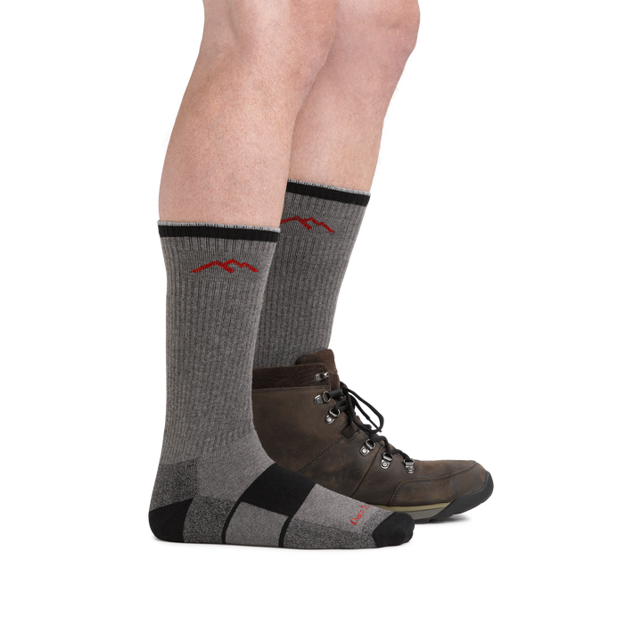 Man wearing Coolmax Hiker Boot Hiking sock in gray/black and back foot wearing the sock and a hiking boot