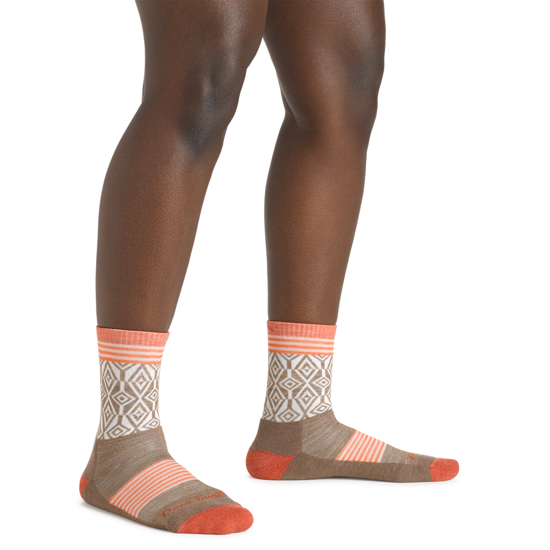 Image of a woman's legs on a white background wearing Women's Sobo Micro Crew Lightweight Hiking Socks in bark colorway
