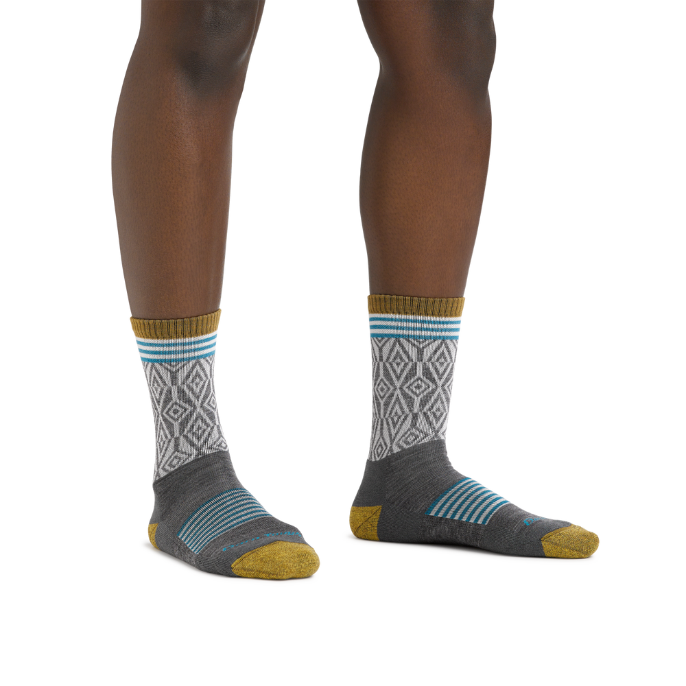 Image of a woman's legs on a white background wearing Women's Sobo Micro Crew Lightweight Hiking Socks in Gray