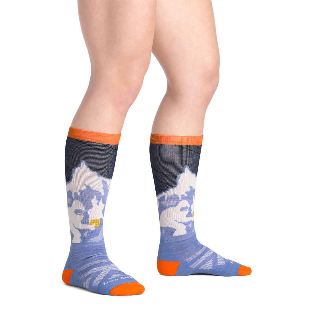 on model image bare foot wearing the 3809 little yeti over the calf sock in midnight colorway