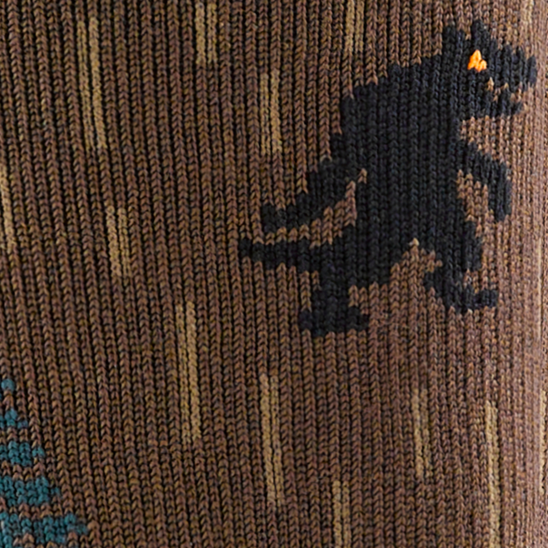 Call out detail image of the of the 5015 earth front image of the yarn goblin walking 