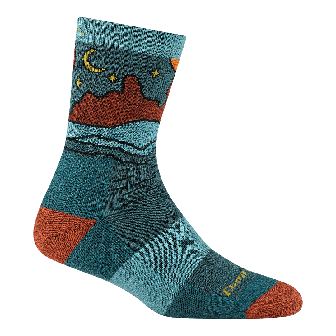reverse 5023 Celeste micro crew in teal featuring a blue body orange heel/toe and nightime canyon landscape on the ankle