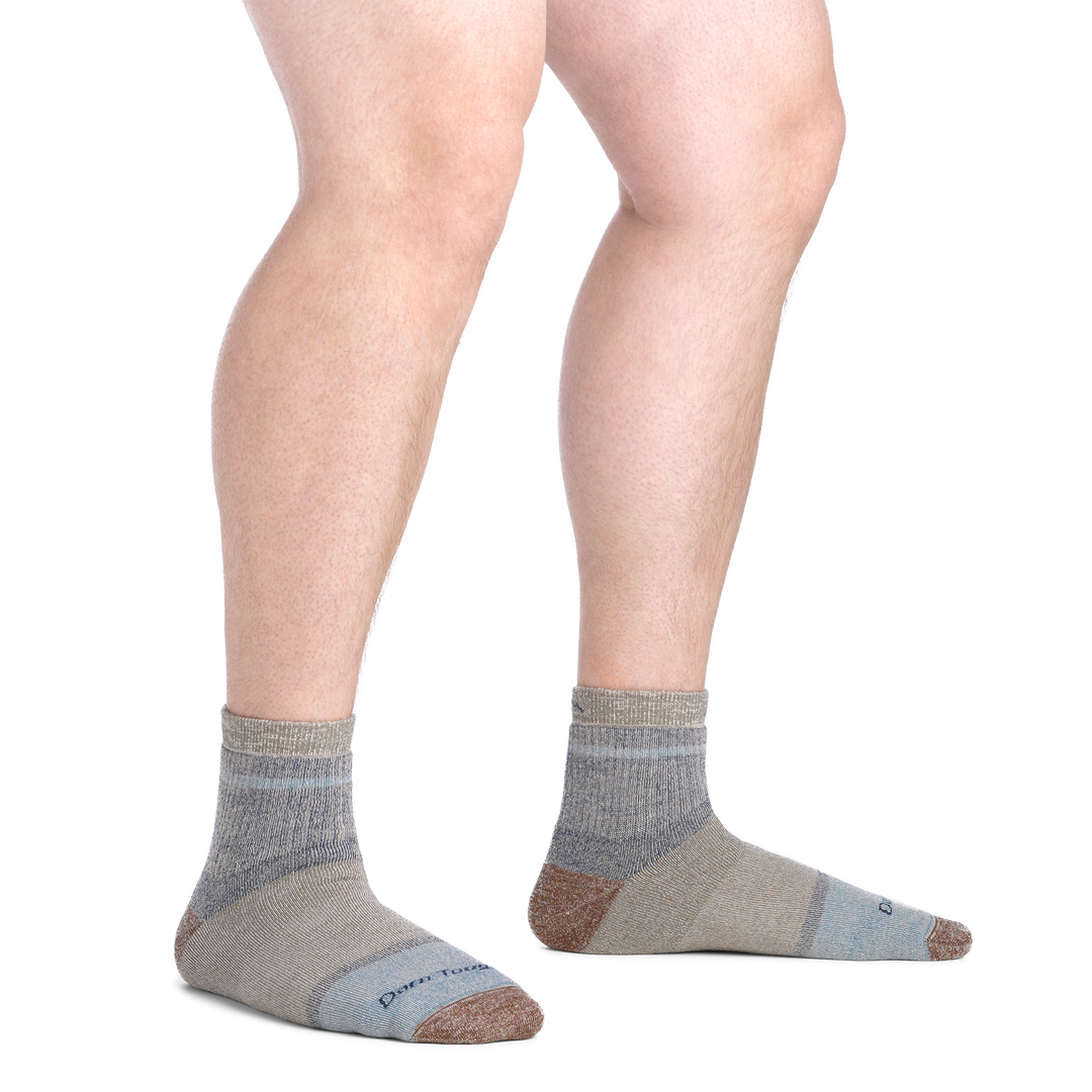 on model image bare foot wearing the 6118 shorty lifestyle sock in canteen colorway