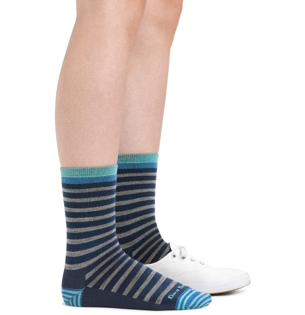 A pair of feet wearing no cushion lightweight socks with stripes