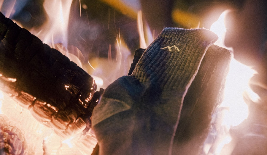 A sock in the middle of a fire, about to get burnt