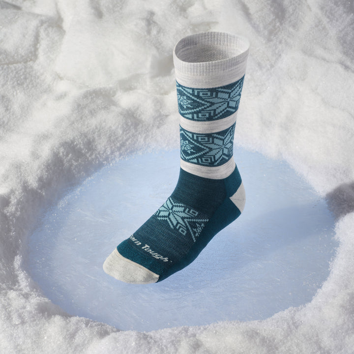 elsa crew sock on ice spot in the snow