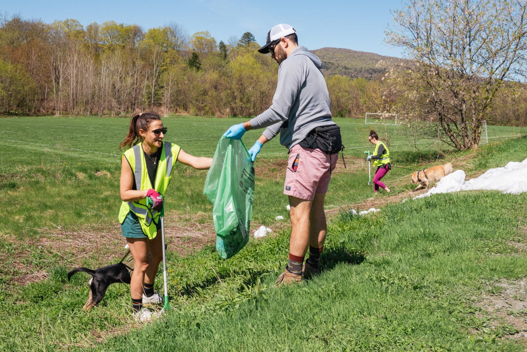 Darn Tough employees picking up litter around the state for Vermont Green-Up Day