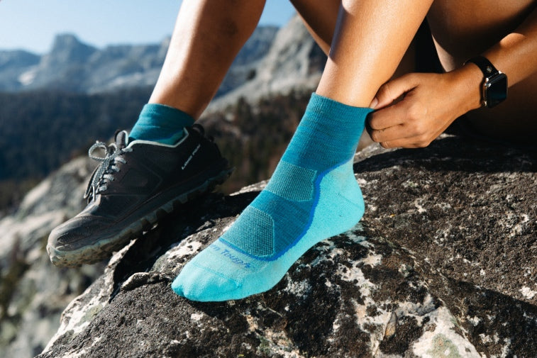 Shop Best Selling Socks for women - feet wearing blue hiking socks, a great Mother's Day gift