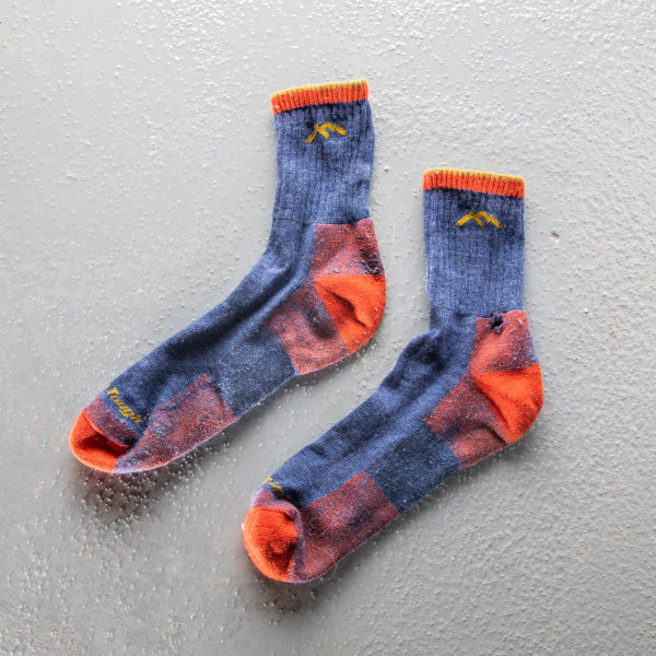A pair of old 1466 denim hiker micro crew socks that were warrantied