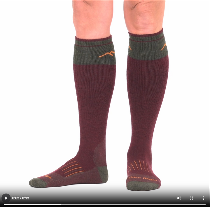 Model walking in the 2105 hunting over the calf sock in ember