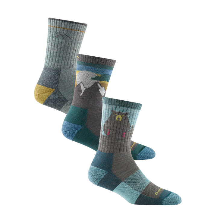 Studio shot of the Sage/Aqua bundle which features the Women'sHiker Midweight in Sage, Sunset Ledge in Taupe, and Bear Town in Aqua