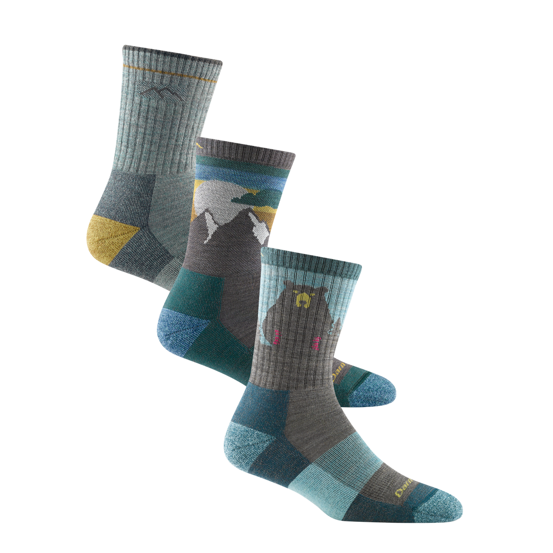 Studio shot of the Sage/Aqua bundle which features the Women'sHiker Midweight in Sage, Sunset Ledge in Taupe, and Bear Town in Aqua