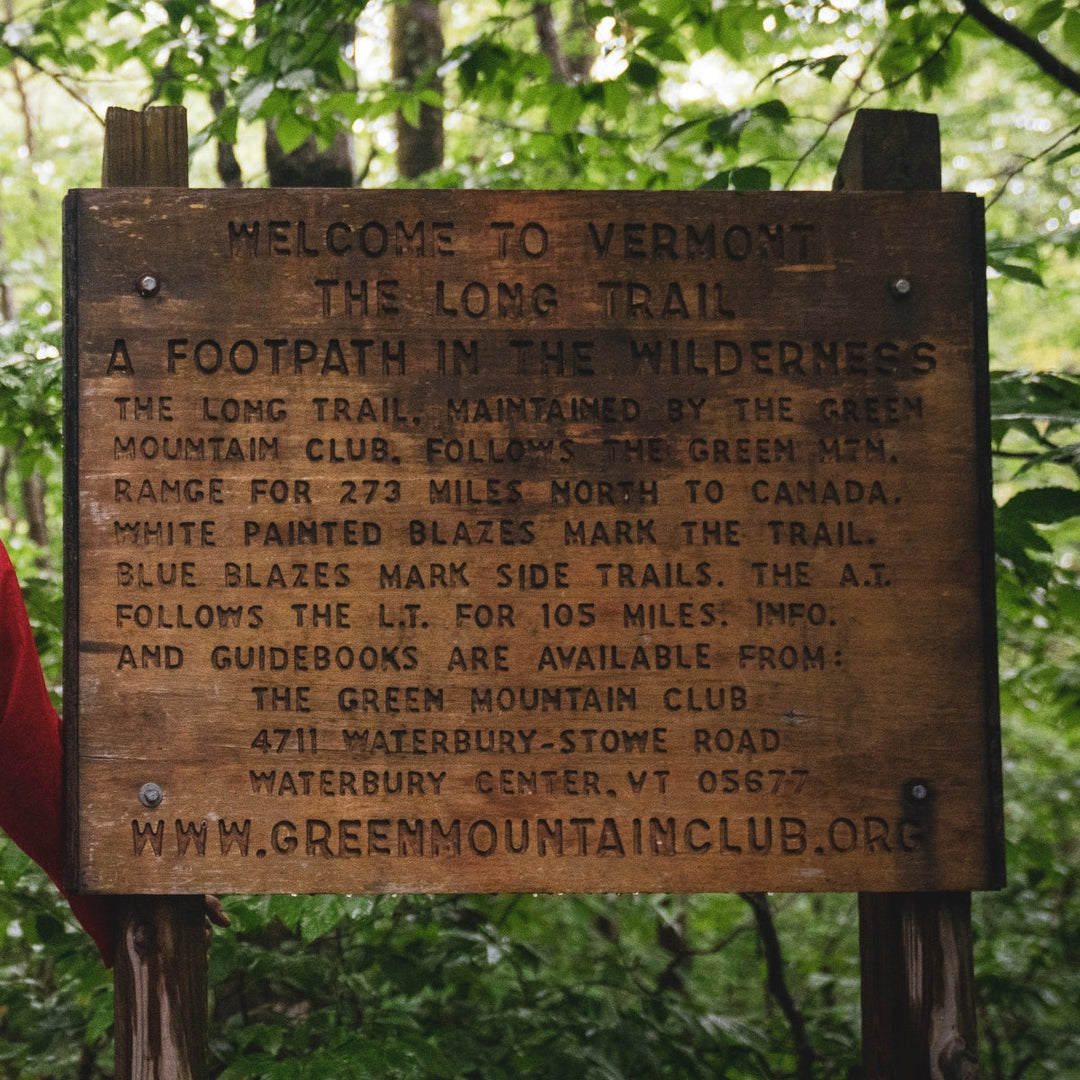 A wooden sign welcoming you to Vermont's Long Trail