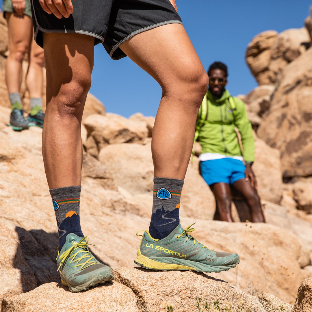 Hiker wearing the CDT socks that support the Continental Divide Trail Coalition