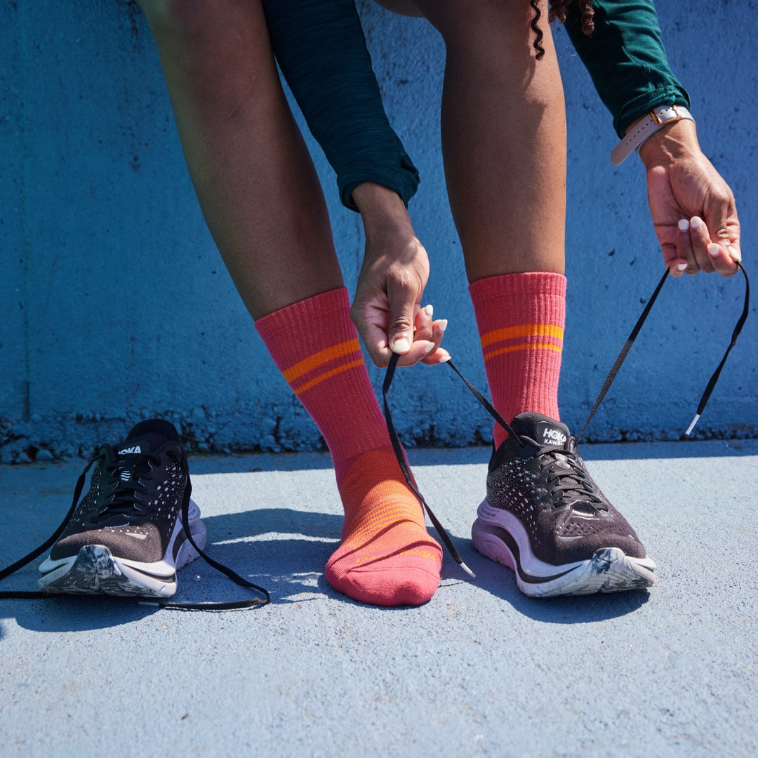 Running put on pink running socks (which are totally worth it)