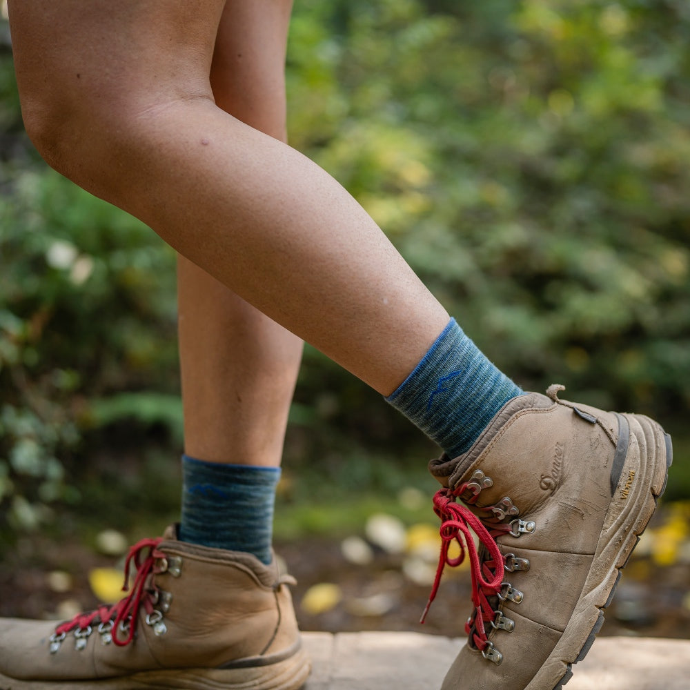 Feet wearing high quality merino wool hiking socks from Darn Tough