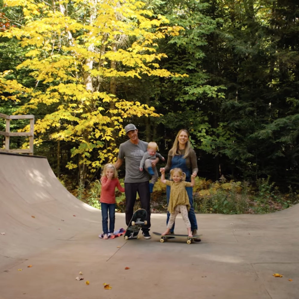 Jake Blauvelt standing in Vermont with his family