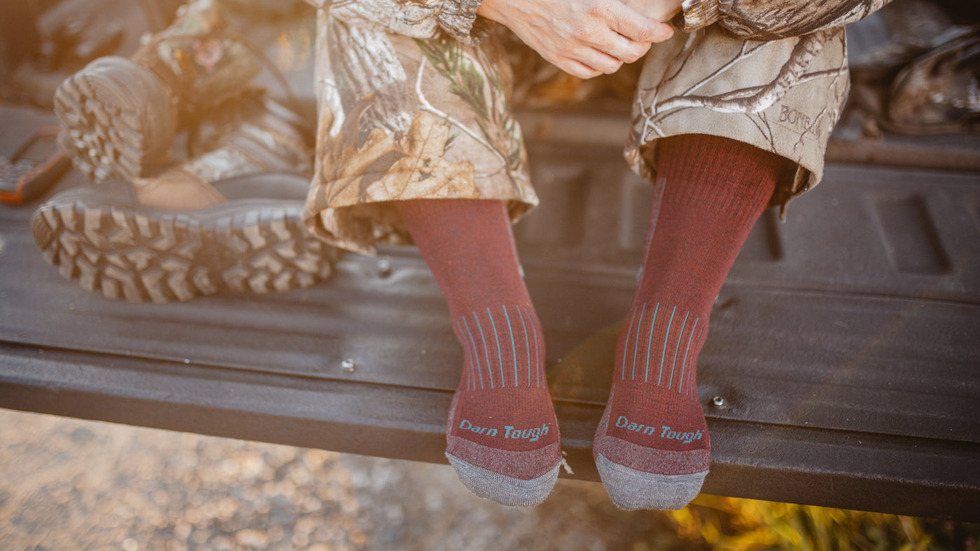 Close up on model featuring the Women's Heavyweight Hunting socks