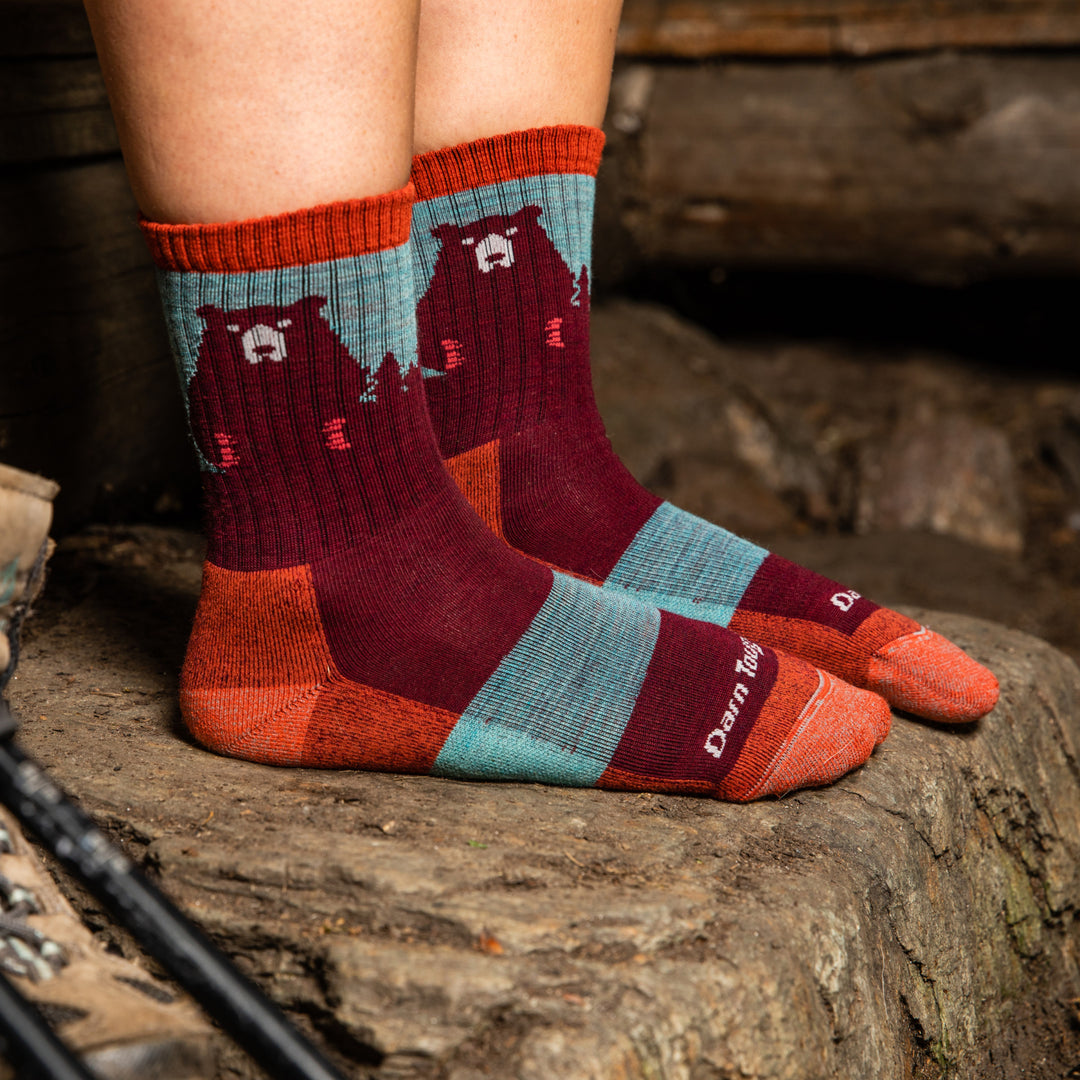 Hiker's feet wearing the Women's Bear Town hiking socks in burgundy