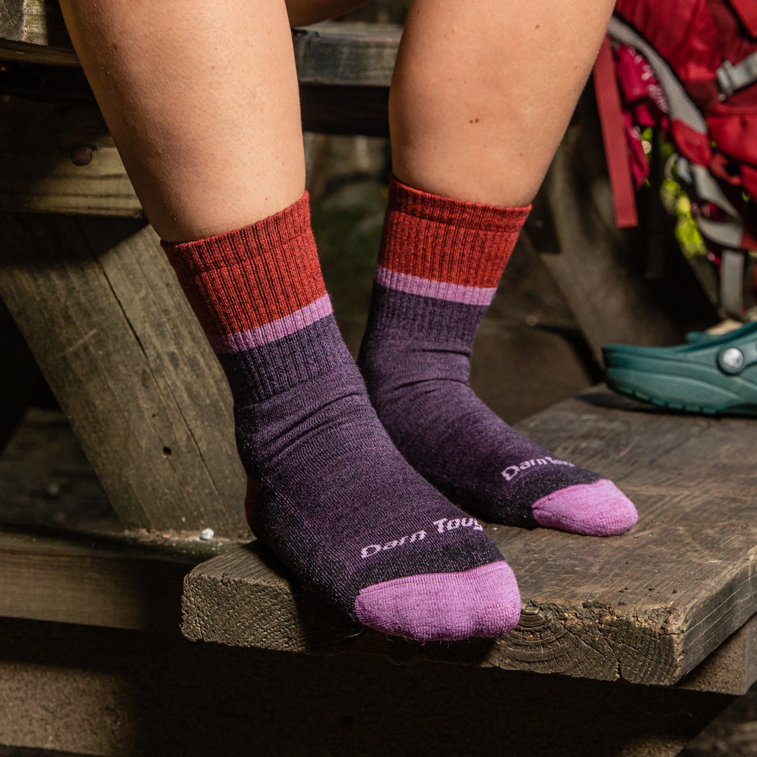 Hiker's feet wearing the soft Ranger twisted yarn hiking socks in heather plum