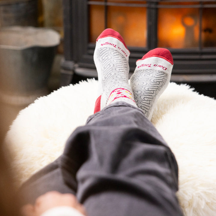 close up of models feet in front of fire place wearing 6141 nordic twist crew lightweight with cushion ash