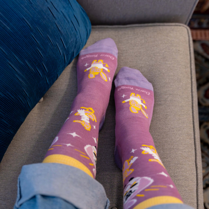 models feet on a couch cushion image from above of the 6220 close kit in violet