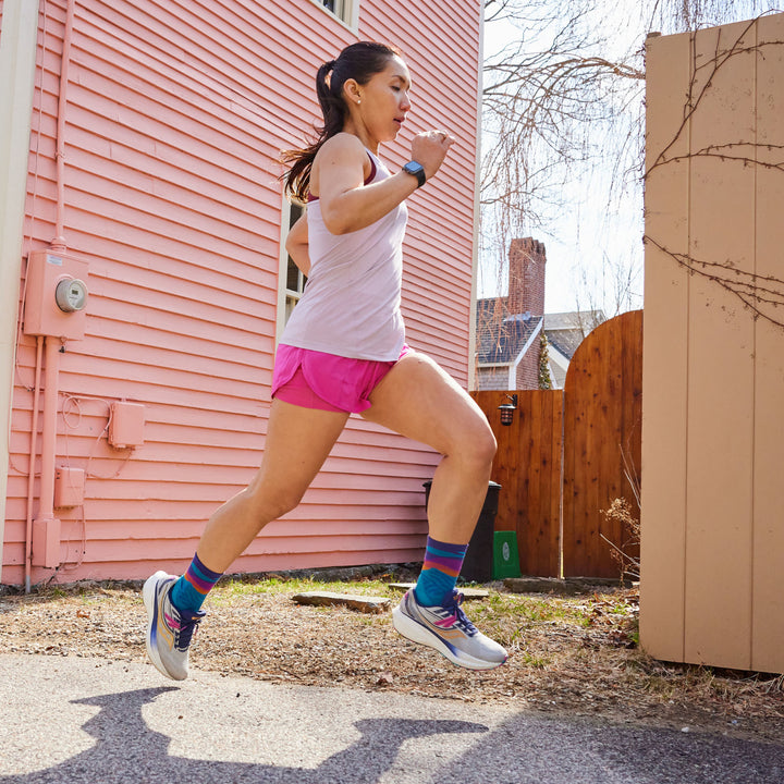 Model running wearing the 1067 Mirnavated Micro Crew running sock in cascade 