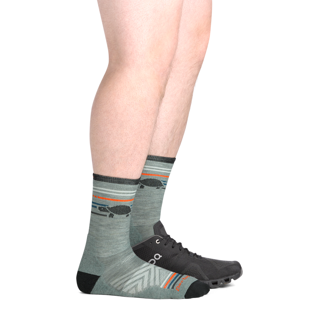 on model image from side view with back foot in a shoe wear the 1041 pacer micro crew sock in seafoam colorway