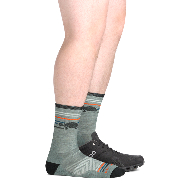 on model image from side view with back foot in a shoe wear the 1041 pacer micro crew sock in seafoam colorway
