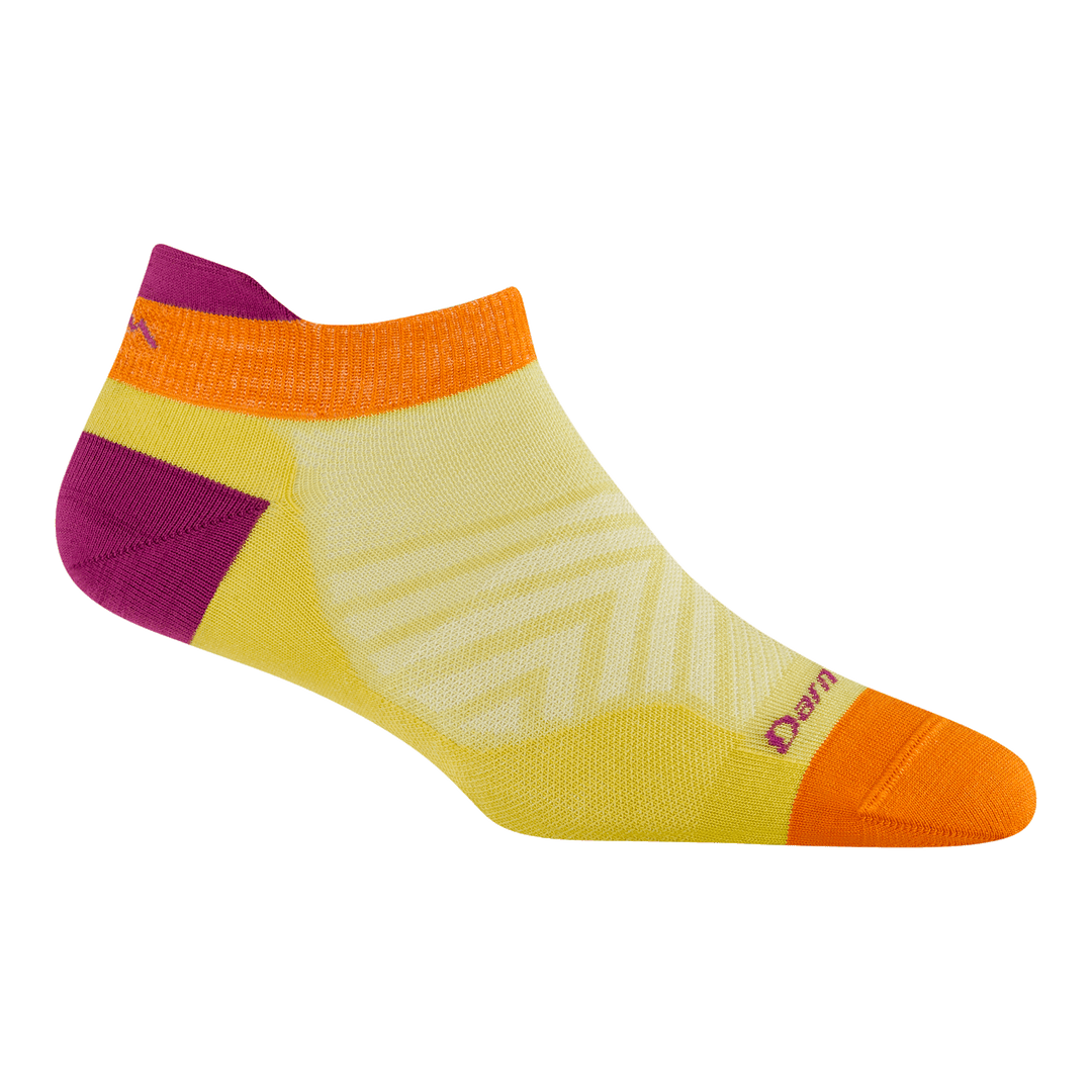 1043 no show running sock in citrus featuring orange toe yellow body, and fuchsia heel/tab 
