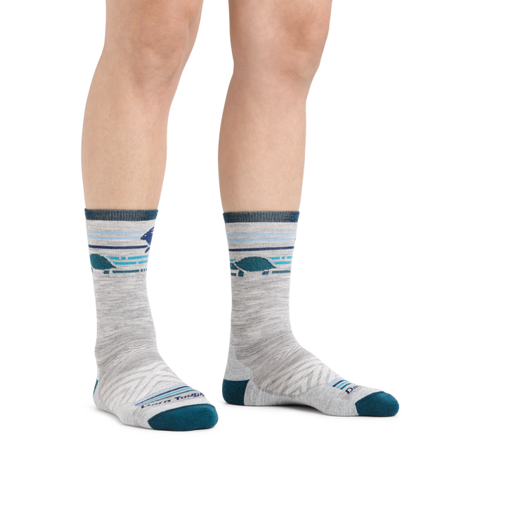 Image of a woman's legs on a white background wearing Women's Pacer Micro Crew Ultra-Lightweight Running Socks in Ash