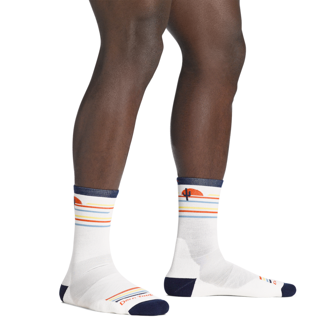 on model image bare foot wearing the 1062 front runner micro crew running sock in white colorway