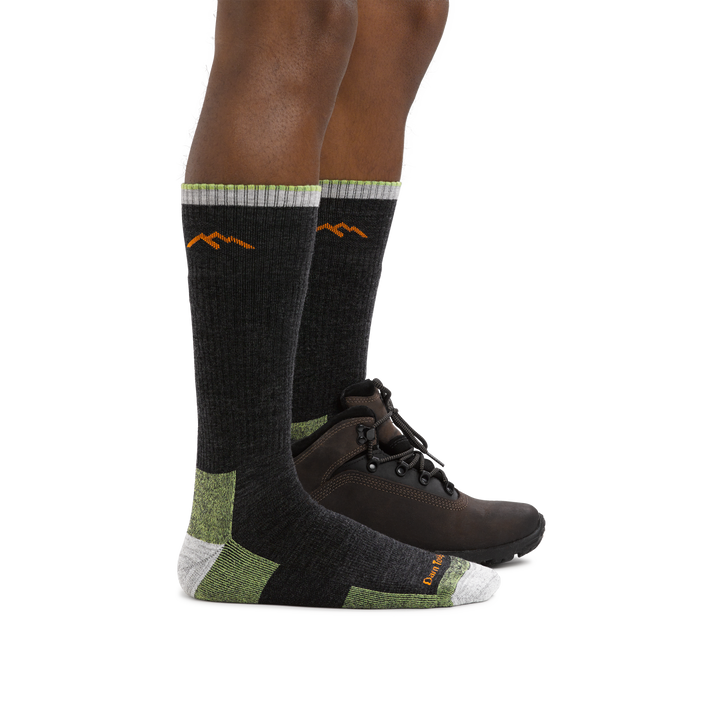Man  wearing Hiker Boot Midweight Hiking Socks with Cushion in Lime, back foot wearing a hiking boot
