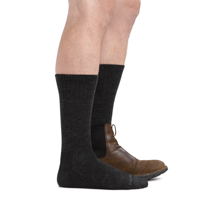 Man wearing The Standard Crew  Lightweight Lifestyle Sock in Charcoal wearing a boot on the back foot