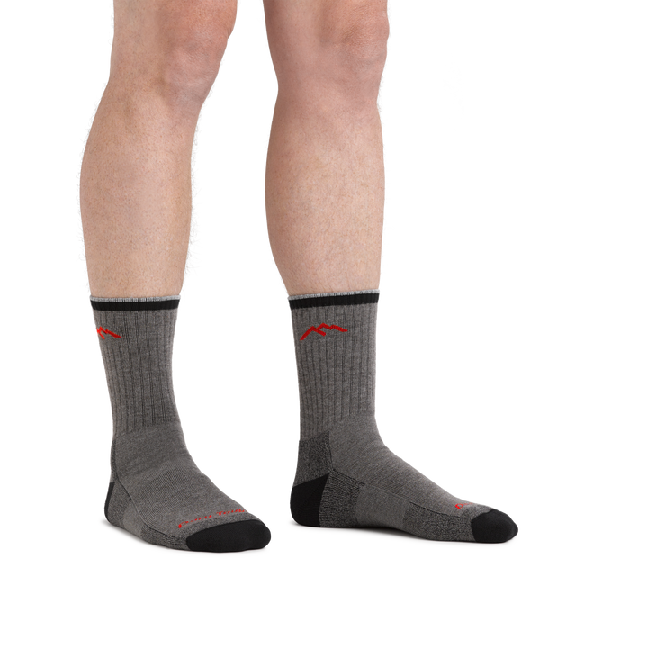 Man standing barefoot wearing Coolmax Hiker Micro Crew Hiking Socks in Gray/Black
