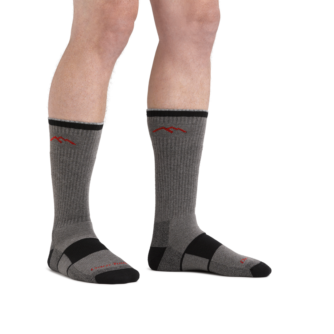 Man standing barefoot wearing Coolmax Hiker Boot Hiking sock in gray/black