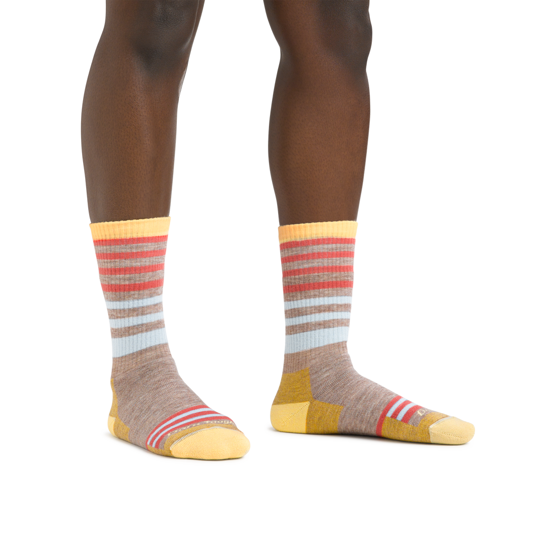 Image of a woman's legs on a white background, wearing Women's Gatewood Boot Midweight Hiking Sock in Oatmeal