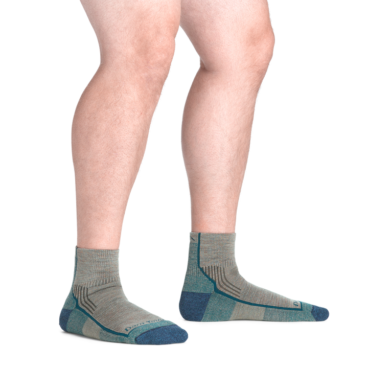 model standing barefoot wearing the 1959 quarter midweight hiking sock in rye colorway