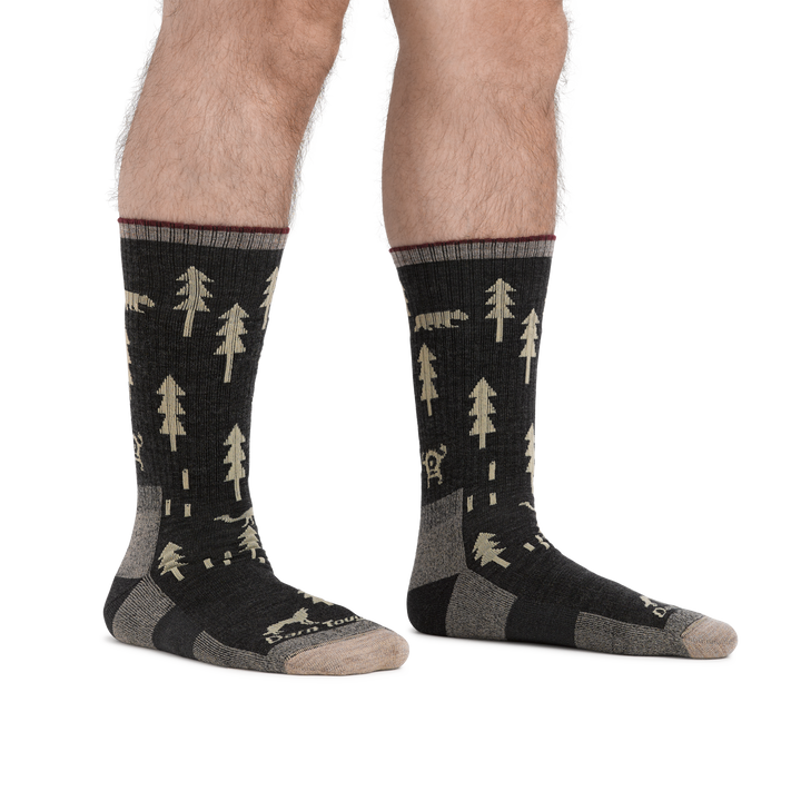Man wearing ABC Boot Midweight Hiking Socks in Black, showing height of socks is approximately mid-shin.