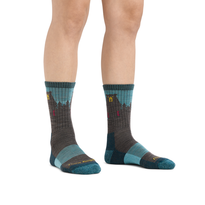Image of a woman's feet on a white background, wearing Women's Bear Town Micro Crew Lightweight Hiking Socks in Aqua