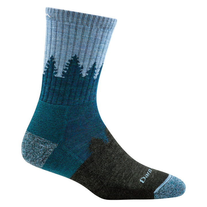 Reverse side of women's treeline micro crew hiking sock in color blue with tree silhouette and white moon design